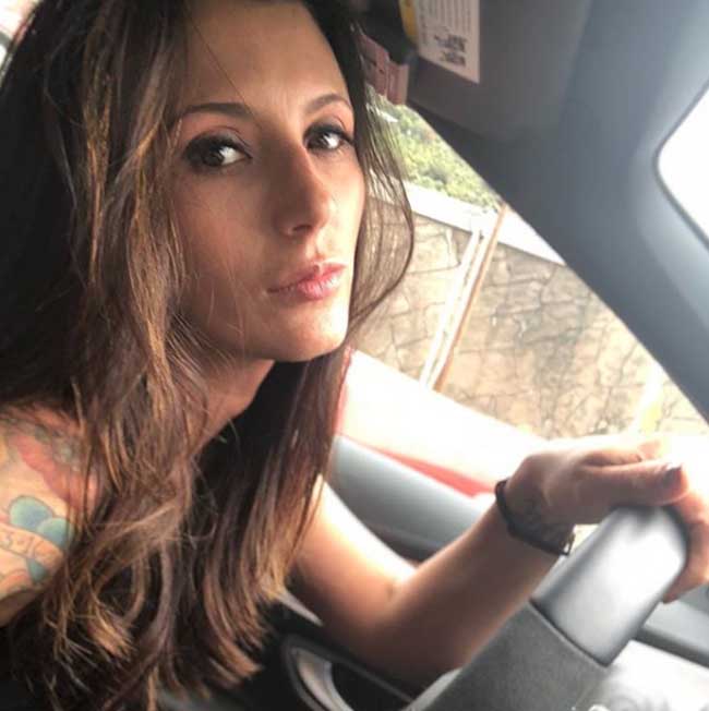 A picture of Talinda Bennington driving.
